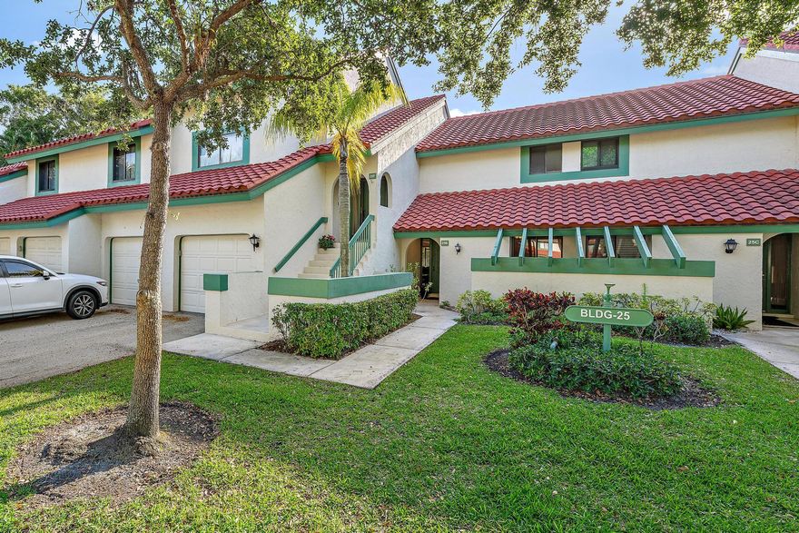 WOW!  Welcome home to a stunning ATTACHED GARAGE, GROUND FLOOR home in the heart of PGA National! This 2 Bedroom, 1.5 Bathroom Unit FEELS like a secluded villa and will not disappoint! Completely Remodeled and no detail was overlooked! Enter through the quaint front Patio or through your 1 Car Garage and feel at ease immediately. Wood-look tile and updates galore ensure you feel right at home. An Open Living Area meets the Dining Room and both have a fantastic view of the screened patio and garden area beyond. Large, fully updated kitchen with Stainless Steel Appliances, Granite Countertops and White Shaker Cabinetry.The spacious Primary Bedroom overlooks the patio as well and offers tons of closet space. The Bathroom has a Separate Soaking Tub and Shower and there is an additiona