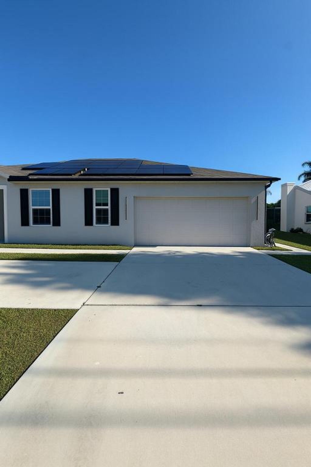 Photo of 1963 SW Import Drive, Port Saint Lucie, FL 34953 (MLS # R11142164)
