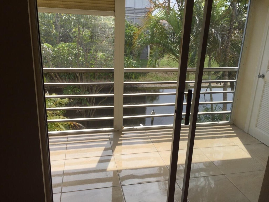Photo of 2878 DONNELLY Drive #207, Lake Worth, FL 33462 (MLS # B26079385)