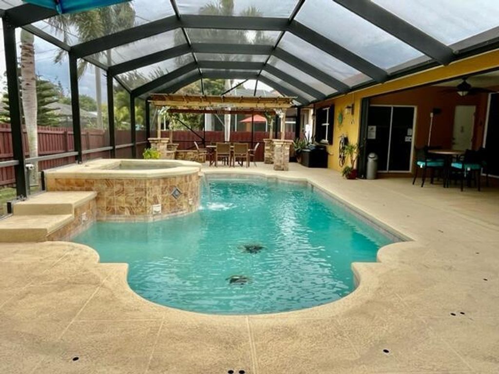 Photo of 3231 SW Savona Boulevard, Port St Lucie, FL 34953 (MLS # R10960367)