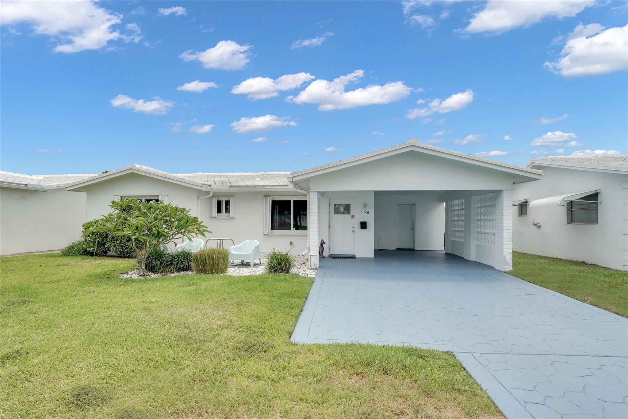 This updated Leisureville home is ready for you to enjoy the south Florida lifestyle. Everything has been updated within the past few years. Main roof 2015, flat roof 2024, new stamped concrete driveway 2024, new kitchen, appliances & under sink water filter 2024, Impact windows 2020 + locking accordian shutters, bathrooms updated 2021, new AC & duct cleaning 2024, tankless water heater 2025, updated landscaping / rocks 2024. 2 Community pools, par 3 golf course, shuffleboard, 2 clubhouses, exercise room, management on site. Low HOA $298 mo includes lawn care, sprinklers, outisde painting. Leisureville requires 700+ credit score, one person on the deed 55+, $350 application fee, $500 capital contribution & $150 record transfer fee at closing.