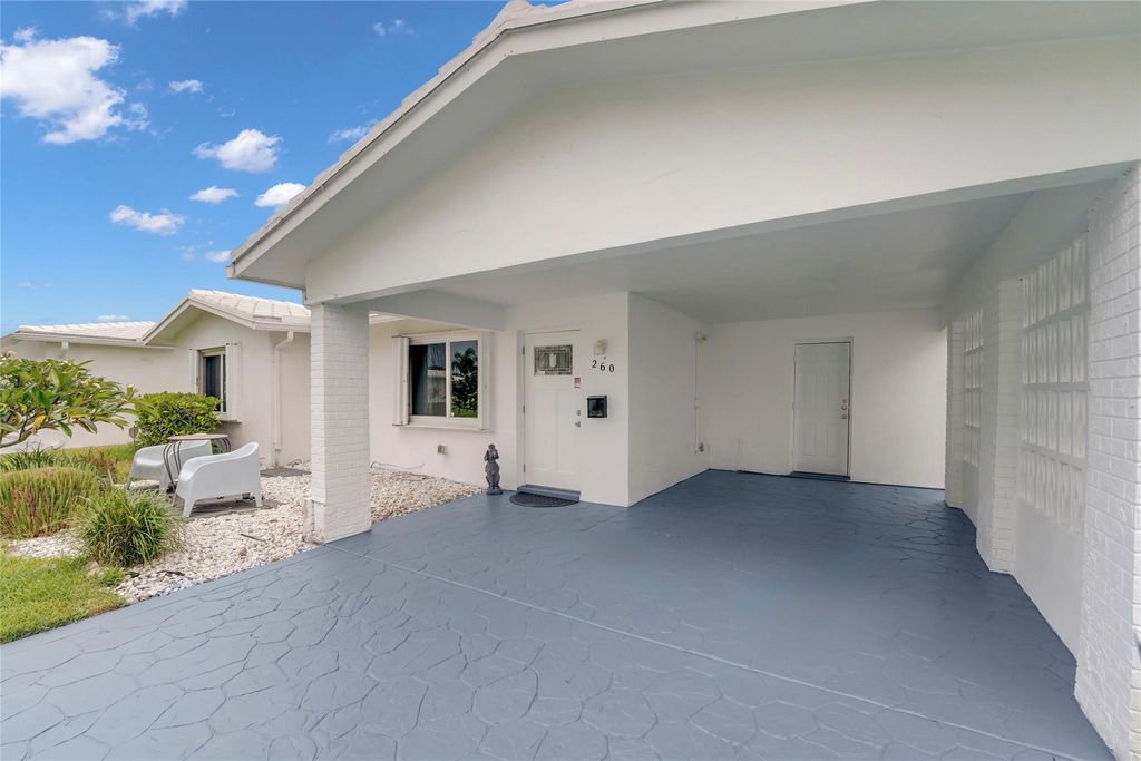 Photo of 260 S Golf Blvd, Pompano Beach, FL 33064 (MLS # F10523153)