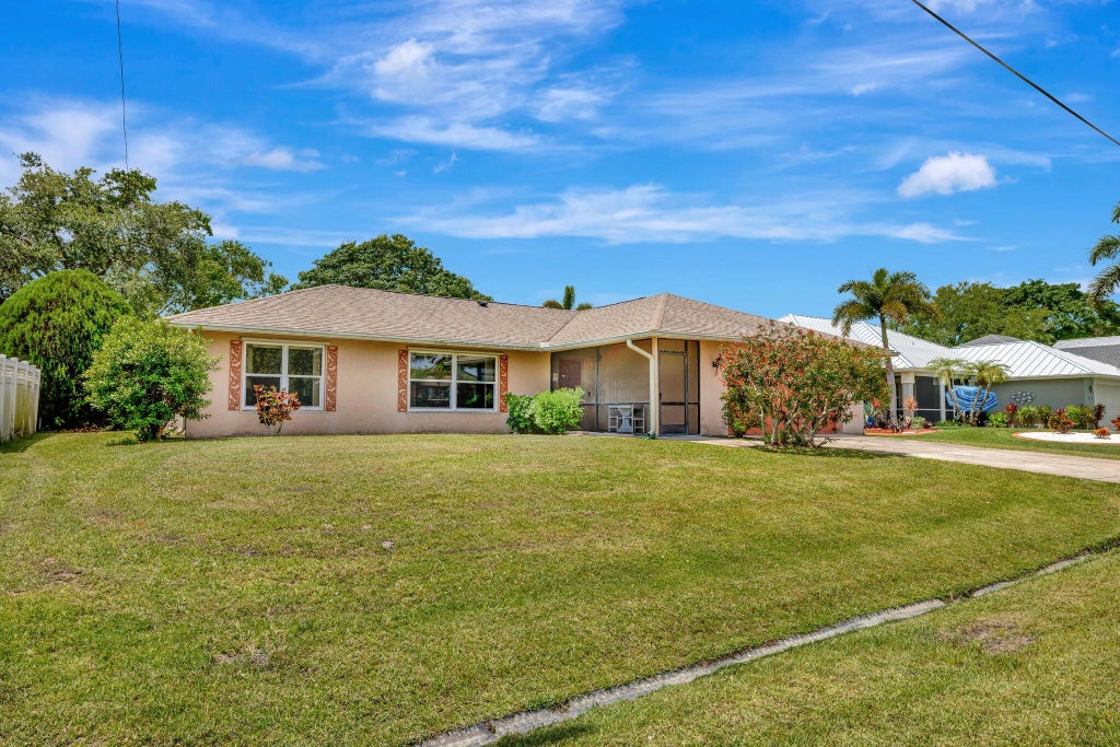 Photo of 472 SW Aster Road, Port Saint Lucie, FL 34953 (MLS # R11091396)