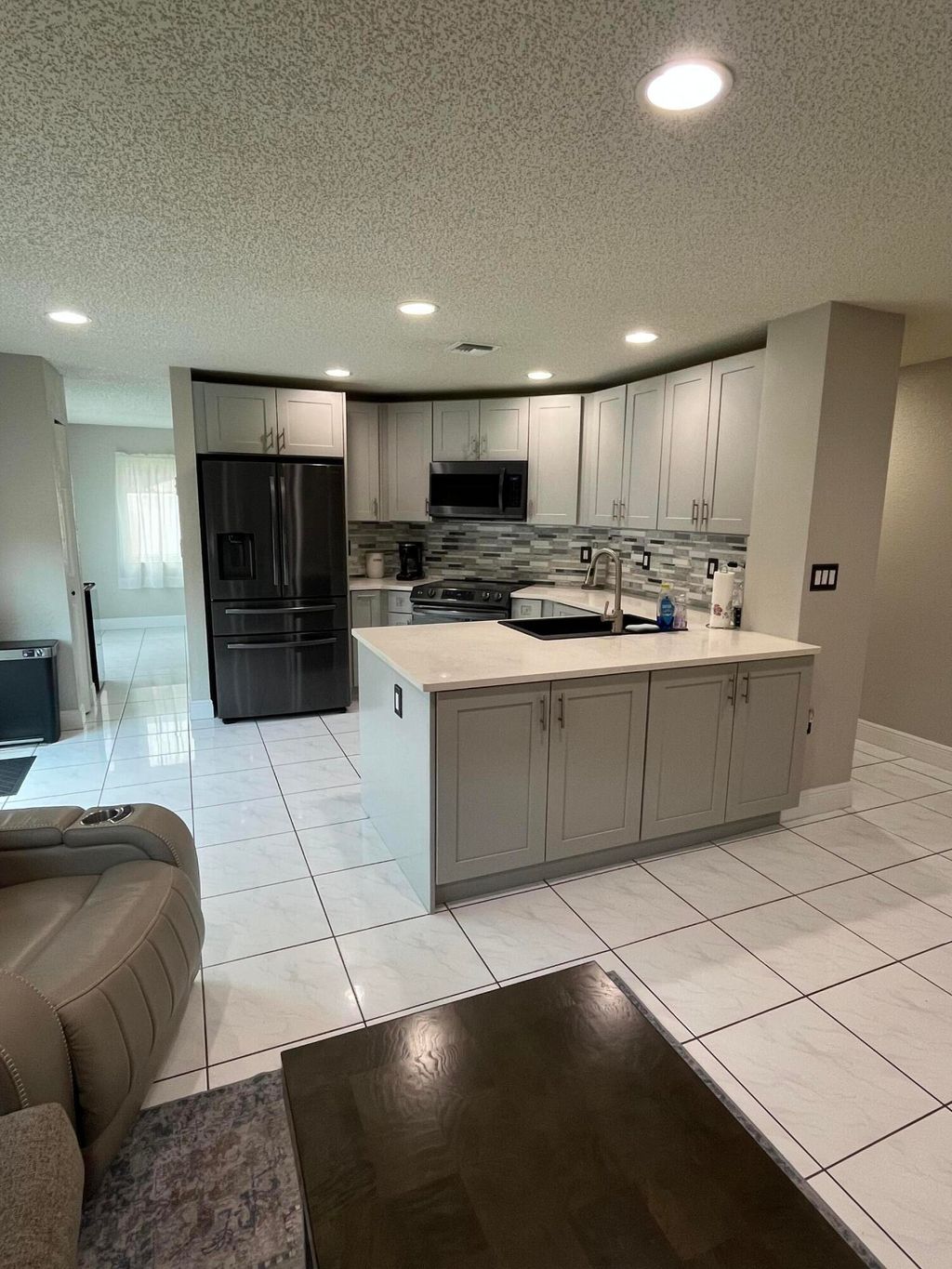Photo of 1933 NW 99th Avenue, Pembroke Pines, FL 33024 (MLS # B26043425)