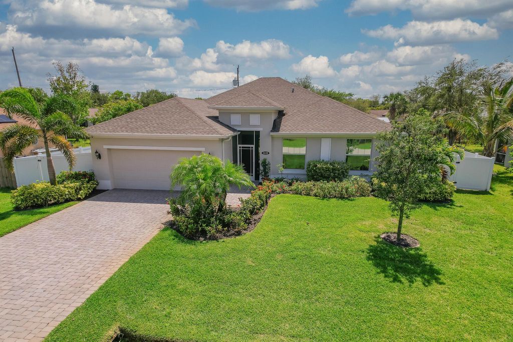 Photo of 3133 SE East Blackwell Drive, Port Saint Lucie, FL 34953 (MLS # R11013722)