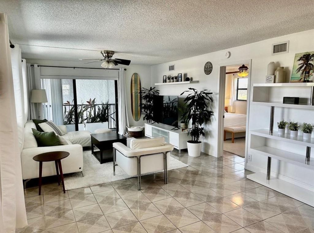 Photo of 1975 SE 3rd Street #403, Deerfield Beach, FL 33441 (MLS # B26013294)