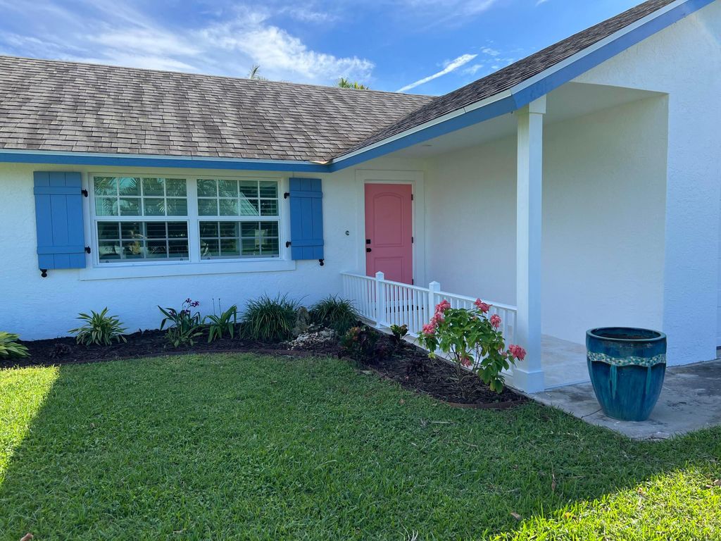 Photo of 8014 SE Carlton Street, Hobe Sound, FL 33455 (MLS # B26027659)