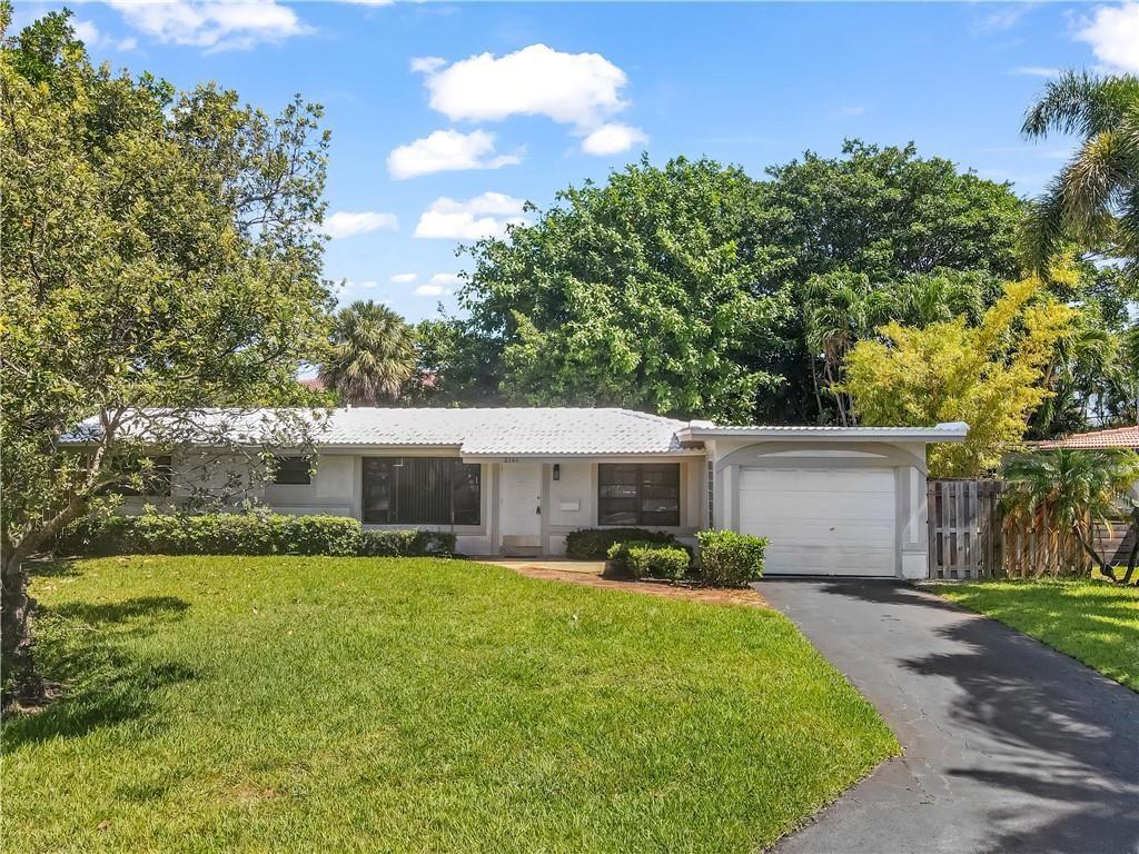 Welcome to this beautifully maintained 2-bedroom, 2-bathroom home with a versatile converted garage—perfect as a third bedroom, home office, or guest space. Nestled in the highly sought-after community of Lighthouse Point, Just minutes from the beach. This home boasts a fully fenced private backyard, perfect for entertaining or simply enjoying Florida’s outdoor lifestyle. Inside, you'll find upgraded bathrooms, tile flooring throughout, no carpet, and a light, open layout that’s move-in ready. Located east of Federal Highway, this home is in a prime central location, just a short drive to both Boca Raton and Fort Lauderdale. Do not miss this wonderful Opportunity!