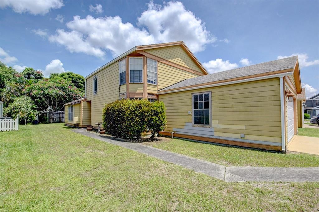 Photo of 1306 Wild Daisy Lane Ln, West Palm Beach, FL 33415 (MLS # R10811409)