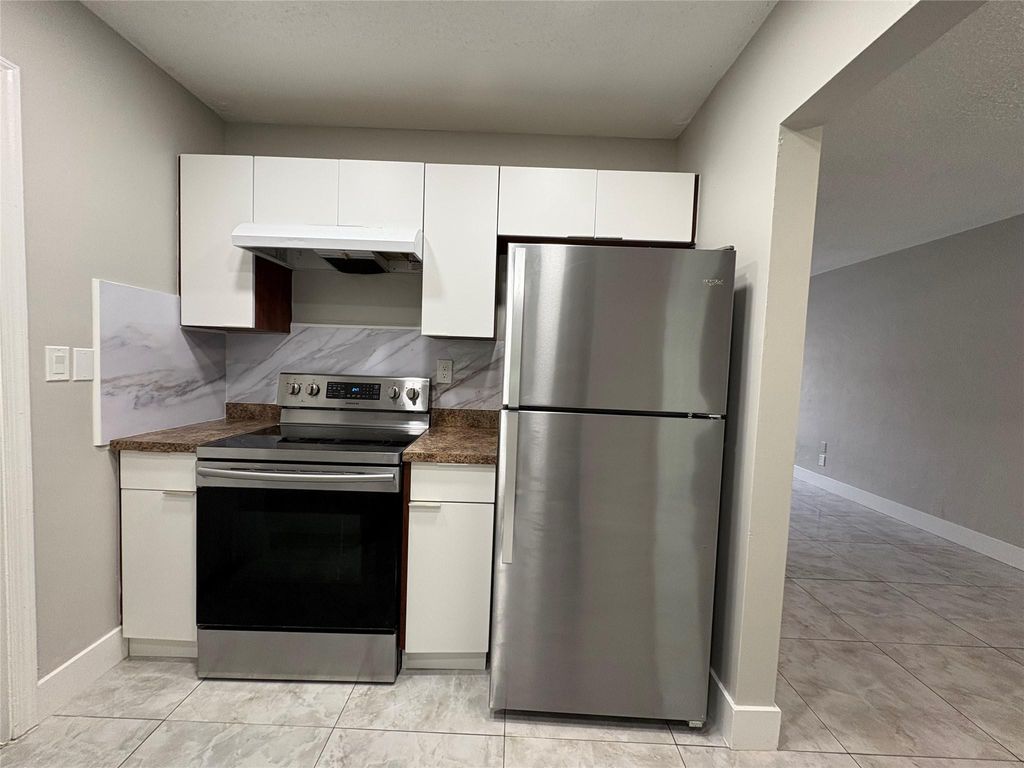 Photo of 6712 NW 60th Street, Tamarac, FL 33321 (MLS # F10532312)