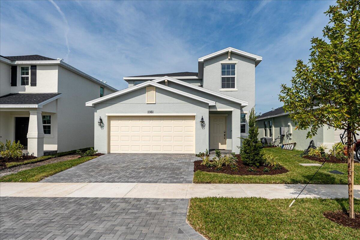 **Newly constructed 5-Bedroom Home in Gated Community!** This stunning two-story, 5-bedroom, 2.5-bath home offers an open-concept layout, seamlessly connecting the kitchen, dining, and living areas for effortless transitions. The first-floor owner's suite provides added privacy, while the second floor features 4 additional bedrooms and a cozy loft. Enjoy outdoor leisure on the ready-to-use patio. The home includes a convenient two-bay garage, stainless steel appliances, a gas range, quartz countertops, upgraded light fixtures, and a Ring doorbell system. **Neighborhood includes a beautiful clubhouse, fitness center, community pool, pickleball courts, playground, and more! This is an incredible opportunity to make this beautiful house in this lovely neighborhood your home!**