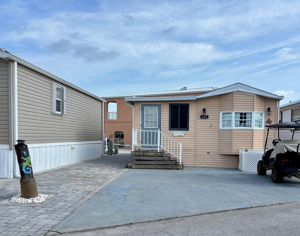 Photo of 323 Nettles Boulevard, Jensen Beach, FL 34957 (MLS # R11088997)