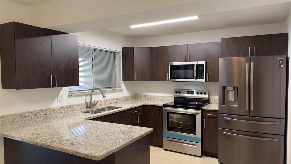 Photo of 5340 Bosque 98 Lane #98, West Palm Beach, FL 33415 (MLS # R11127663)