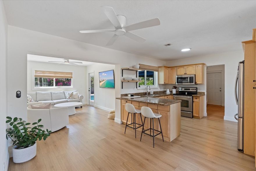 Beautifully 3BR/2BA home in Lighthouse Point with a private pool! This light-filled residence features an open layout, a brand-new roof, full impact windows and doors, and all-new plumbing. The large fenced backyard offers a sparkling pool and plenty of room to relax or entertain. Ideally located near parks, dining, and the marina.