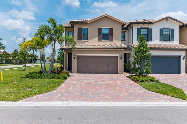 Photo of 8245 Cadre Noir Road Rd, Lake Worth Beach, FL 33467 (MLS # R10815511)