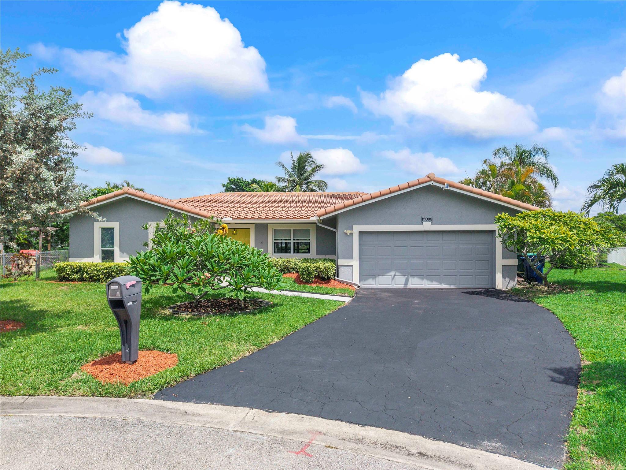 WOW! What an incredible wide water view in Westchester - west Coral Springs! This private backyard can be your tropical vacation every day! This open concept & remodeled 3 bed 2 bath home + media/recreation room is move-in ready - just waiting for you. Perfect location on a quiet cul-de-sac, NO HOA, 2012 new Roof, Impact windows & doors for peace of mind, modern kitchen & fixtures, screened patio, oversized lot and so much more! This home is perfect for kayaking, canoeing, fishing, floating in your pool & watching wildlife. Perfect walkable area: Coral Springs dog park & playground is at the end of the street; Incredible Ice, Sawgrass Springs MS, Coral Glades HS, Westchester ES and the Aquatic Center/Fitness Center all close-by. Hurry to secure your appointment so you don't miss this HOME!