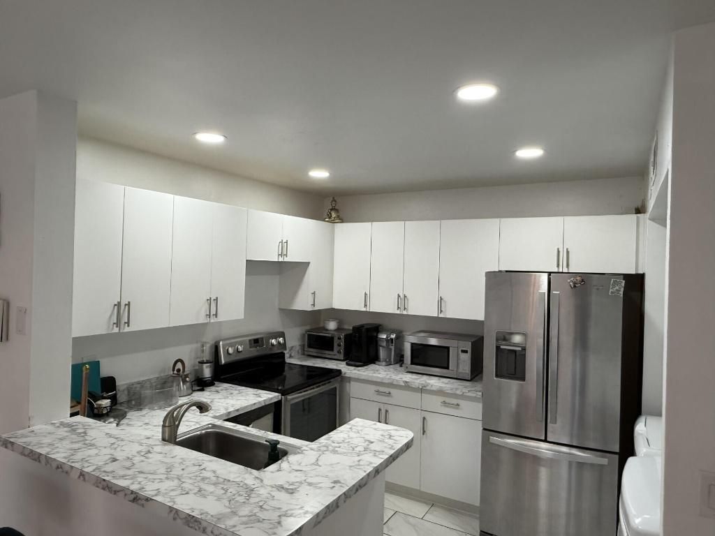 Photo of 3522 Gardens East Drive #A, Palm Beach Gardens, FL 33410 (MLS # R11134627)