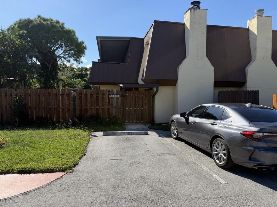 This charming 2-bedroom, 1.5-bathroom townhouse in Palm Beach Gardens offers comfortable living in a highly desirable location. The home features a spacious living room and a dedicated dining area, perfect for relaxing or entertaining guests. Washer and dryer in the unit. Upstairs, the master bedroom features good closet space, his and her sinks a shower-tub combo and the bedroom opens up to a covered second floor balcony. Outside, a private fenced-in yard features a low-maintenance turf lawn and a cement patio, providing a perfect space for outdoor dining or lounging. With its blend of indoor comfort and outdoor appeal, this townhouse is a wonderful place to call home. Two parking spaces just outside the gate and the front door has a cover for those rainy days. Make an appointment today.