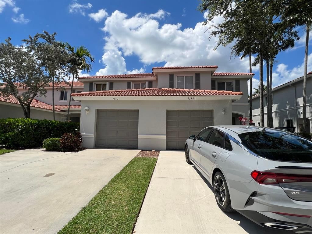 Photo of 7130 Hawks Nest Terrace, Riviera Beach, FL 33407 (MLS # R10897448)