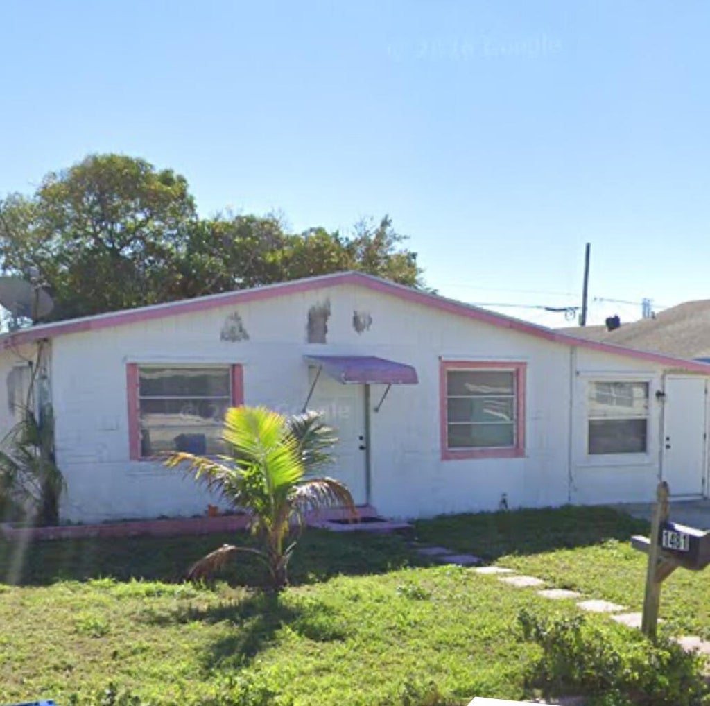Photo of 1481 W 32ND Street, Riviera Beach, FL 33404 (MLS # B26054958)