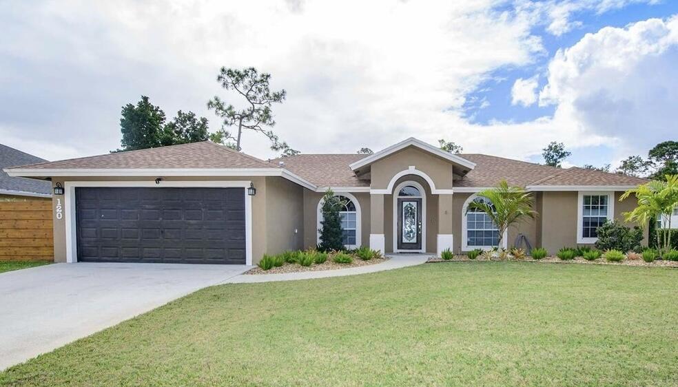 Beautifully updated dream home. This gorgeous 3BR/2BA with bonus room for office, nursery playroom. Home also features private fenced in backyard, sunroom, 2-car garage, new A/C, roof and security system. Enjoy cooking and in the gourmet kitchen and the open floor plan is perfect for entertaining. A serene lake view awaits in the backyard. Don't forget the generator hookup for added convenience. Call today for your private showing