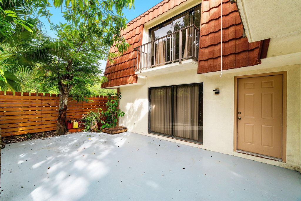 Photo of 3400 Spanish Wells Dr #52-a, Delray Beach, FL 33445 (MLS # B26018150)