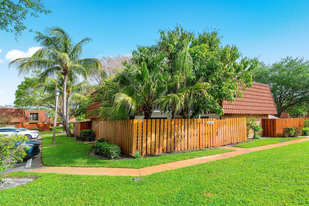 Photo of 3400 Spanish Wells Dr #52-a, Delray Beach, FL 33445 (MLS # B26018150)