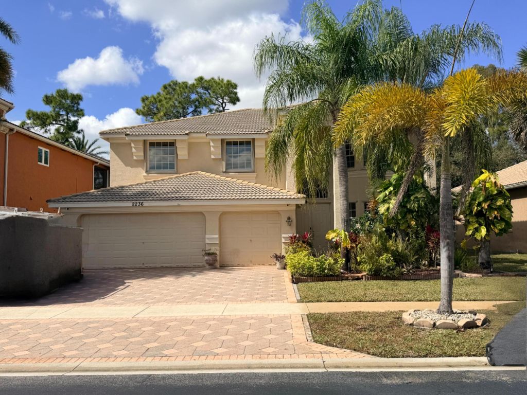 Photo of 2236 Ridgewood Circle, West Palm Beach, FL 33411 (MLS # R11166132)
