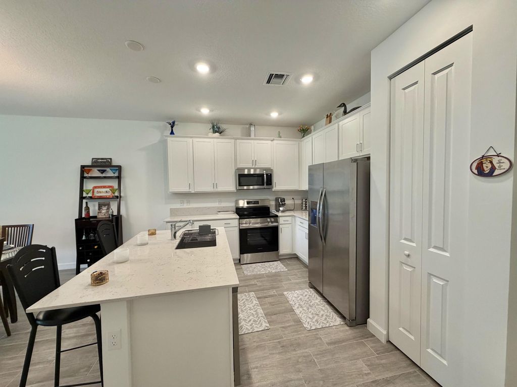 Photo of 13828 Hero Path, Delray Beach, FL 33484 (MLS # B26048631)