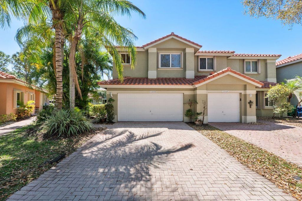 Photo of 12538 NW 57th Court, Coral Springs, FL 33076 (MLS # B26001705)