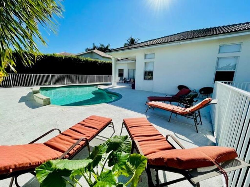 Photo of 11727 Paradise Cove Lane, Wellington, FL 33449 (MLS # R10750384)