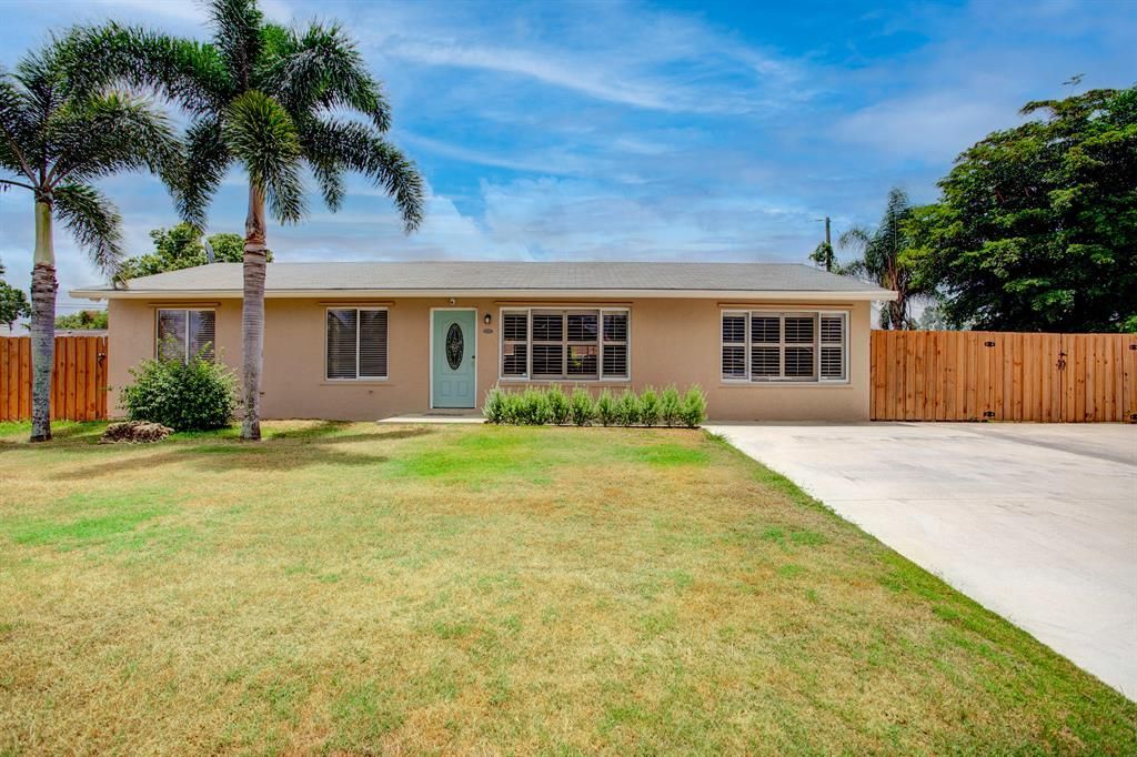 Photo of 9220 Melody Road Rd, Lake Worth, FL 33467 (MLS # R10716741)