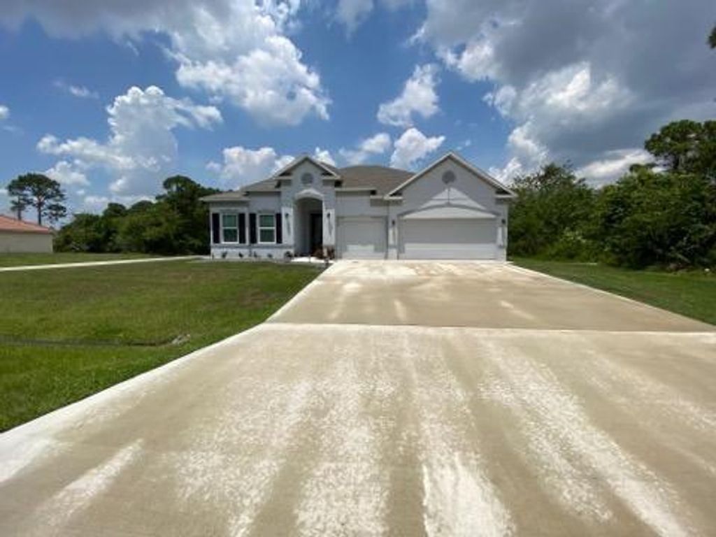 Photo of 1465 SW Malaga Avenue, Port Saint Lucie, FL 34953 (MLS # R10713867)