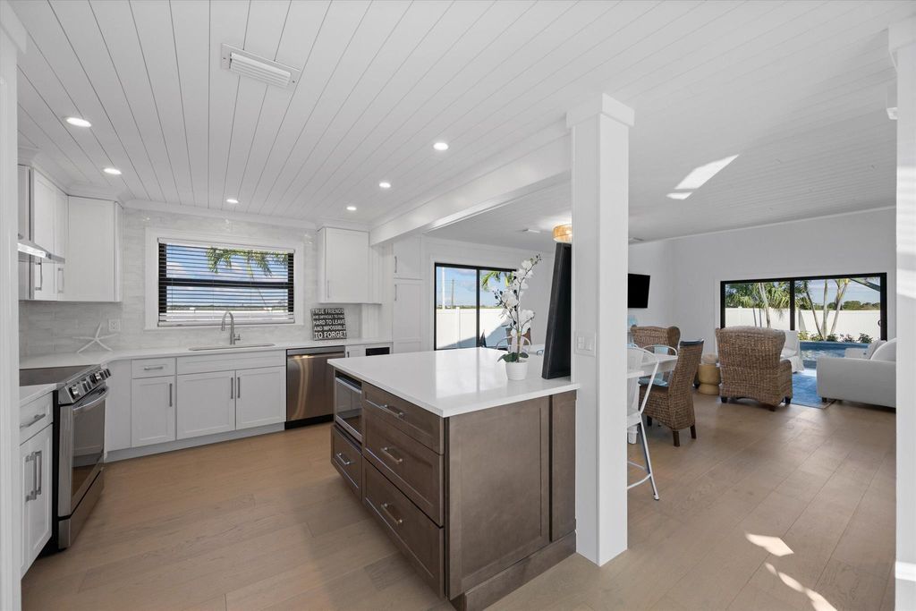 Photo of 481 N Juno Lane, Juno Beach, FL 33408 (MLS # R11138025)