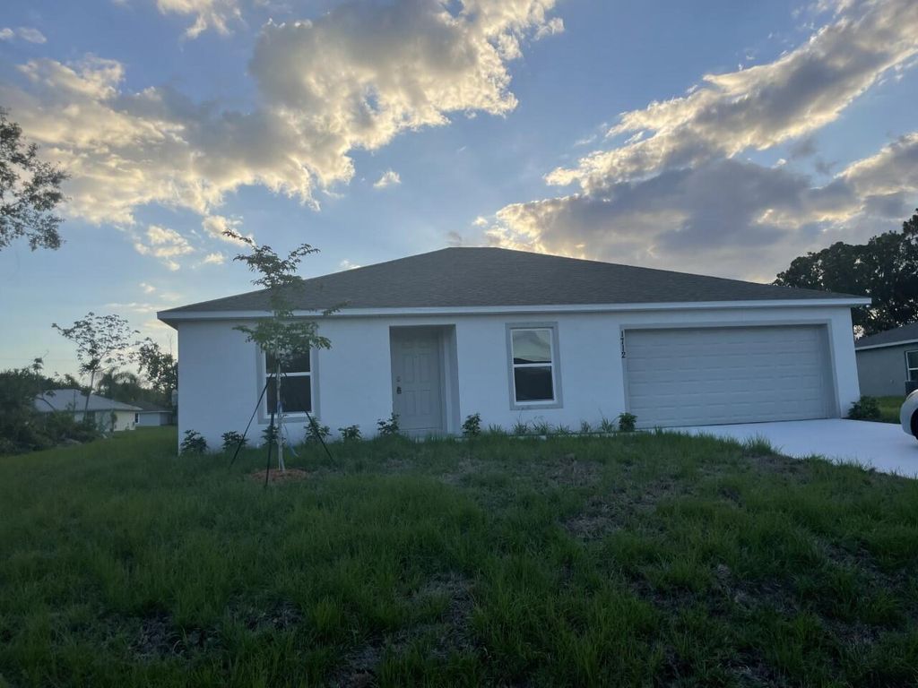 Photo of 1712 SW Glade Street St, Port St Lucie, FL 34953 (MLS # R10805950)