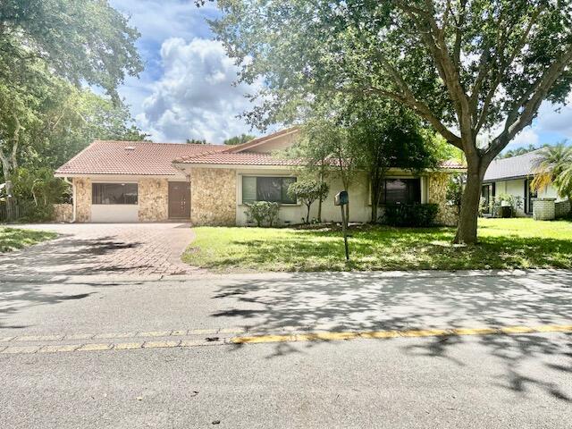 Photo of 501 NW 107th Terrace, Coral Springs, FL 33071 (MLS # B26035920)