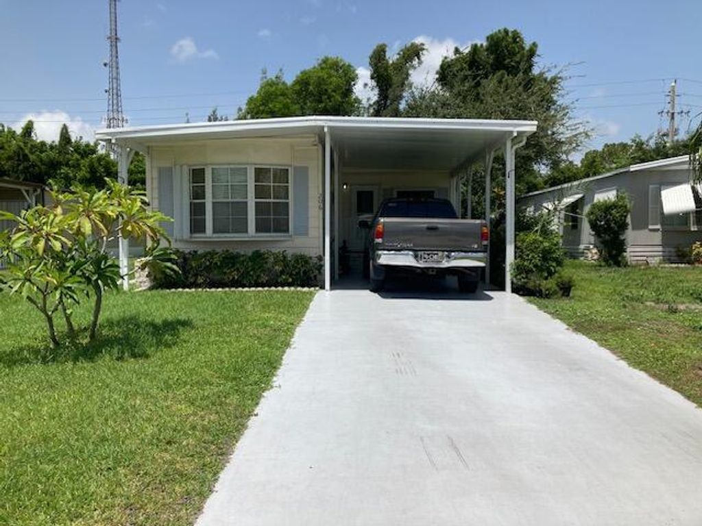 Photo of 206 W Caribbean, Port Saint Lucie, FL 34952 (MLS # B26030761)