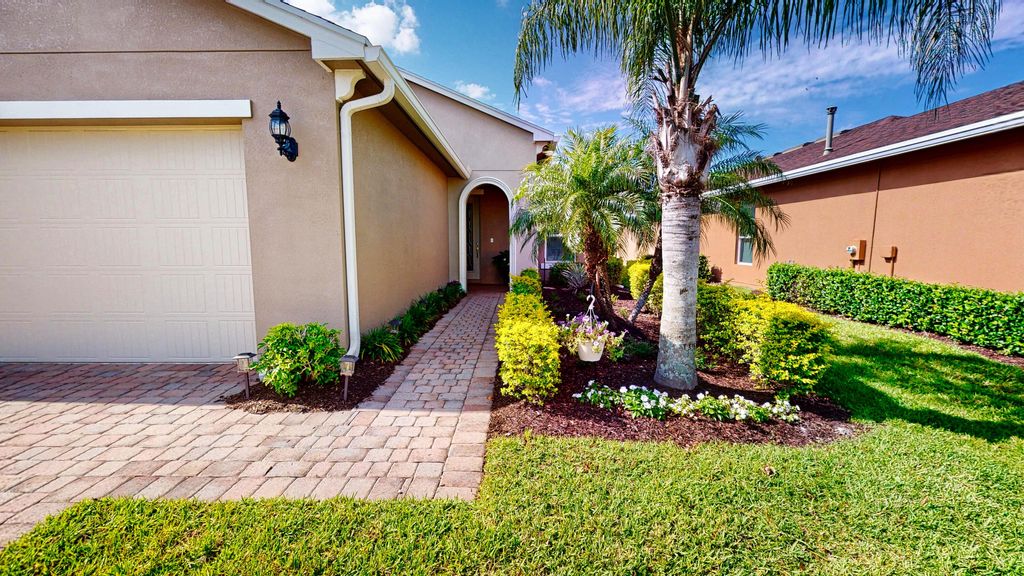 Photo of 12451 SW Weeping Willow Avenue, Port Saint Lucie, FL 34987 (MLS # B26020594)