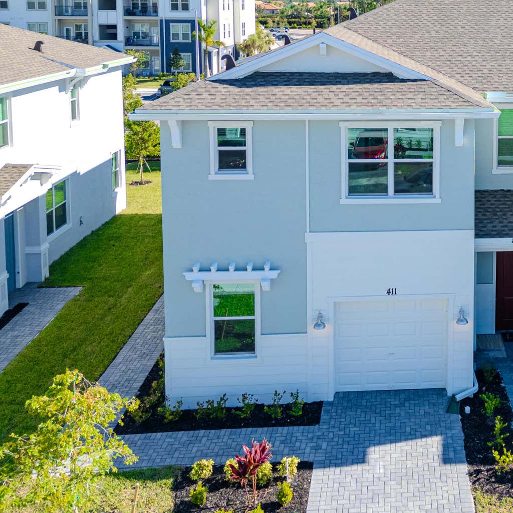 Photo of 411 SE Crossoak Lane, Port Saint Lucie, FL 34984 (MLS # R11040223)