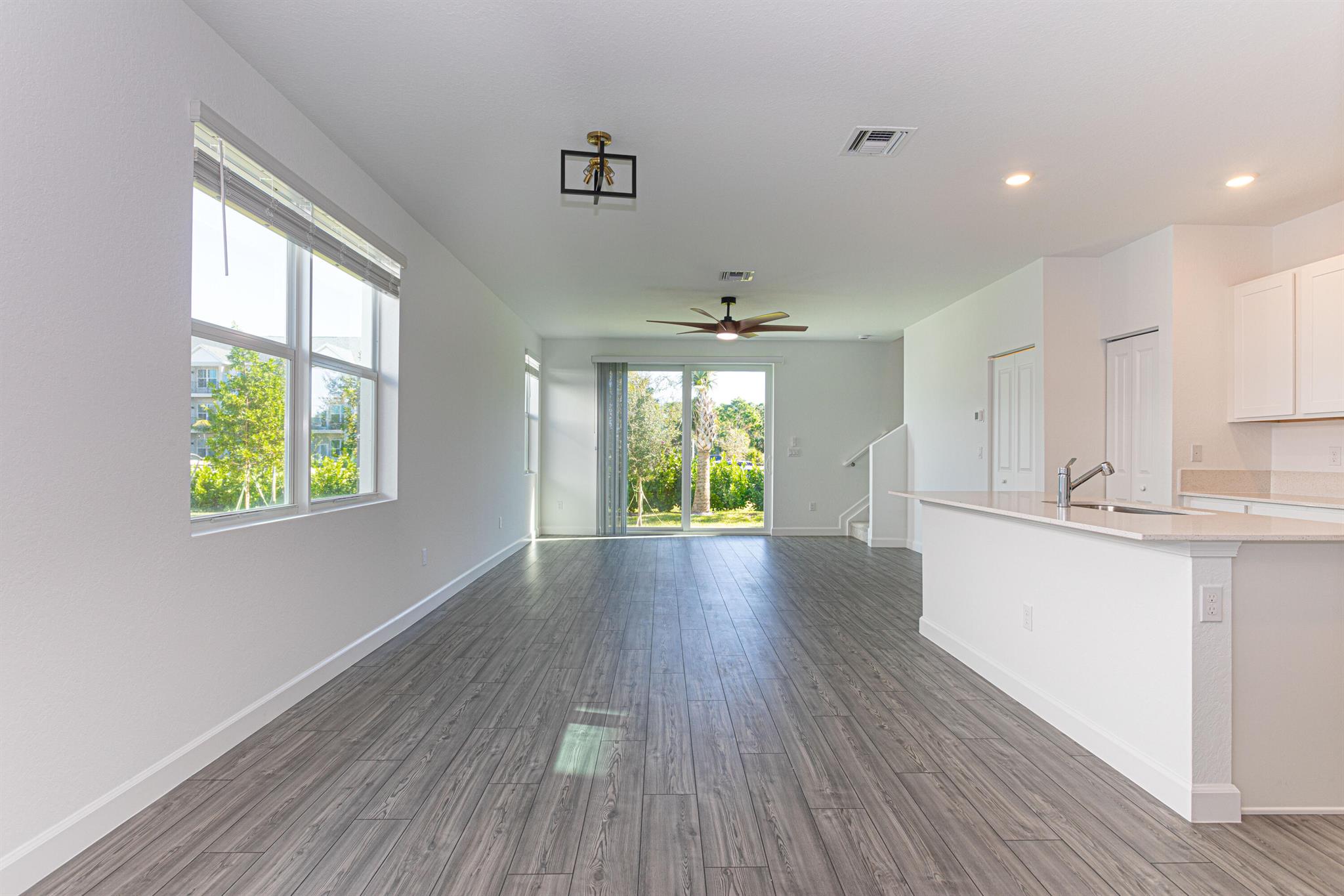 BRIGHT CORNER UNIT WITH A DEN/OFFICE that can be used as a fourth bedroom. Be the first one to live in this spacious townhouse with 3-bedroom and 2 1/2 bathrooms including a convenient jack-and-jill plus the versatile den in the main floor. The modern kitchen with stainless steel appliances and granite countertops opens up to the bright living room and backyard area. The home comes with complete impact windows and doors plus a ring doorbell system for extra security and peace of mind. Internet is included. Veranda Landings is located in a secluded and quiet street right behind The shops at Veranda Falls where you can walk to Publix, Restaurants, Dunkin, Gym, Nail Salon, among other shops/services plus easy access to the turnpike. NO SMOKING.
