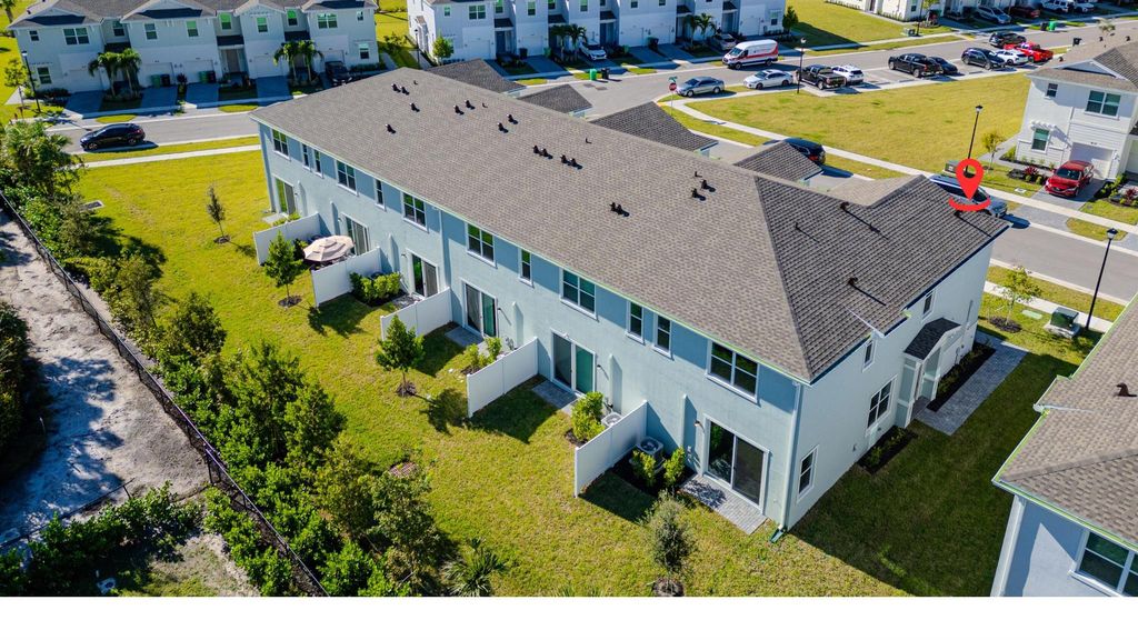 Photo of 411 SE Crossoak Lane, Port Saint Lucie, FL 34984 (MLS # R11040223)