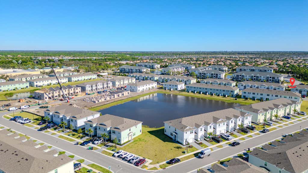 Photo of 411 SE Crossoak Lane, Port Saint Lucie, FL 34984 (MLS # R11040223)