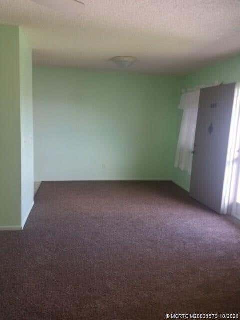 Photo of 1 Lake Vista Trail #205, Port Saint Lucie, FL 34952 (MLS # B26037000)