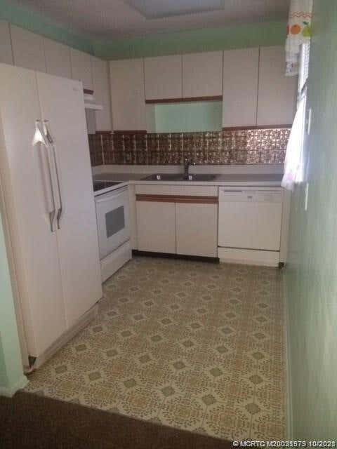 Photo of 1 Lake Vista Trail #205, Port Saint Lucie, FL 34952 (MLS # B26037000)