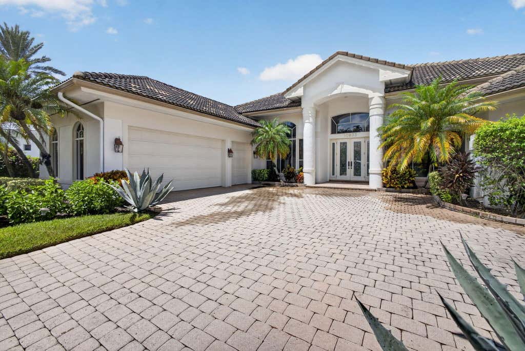 Photo of 10833 Egret Pointe Lane SE, West Palm Beach, FL 33412 (MLS # B26067687)