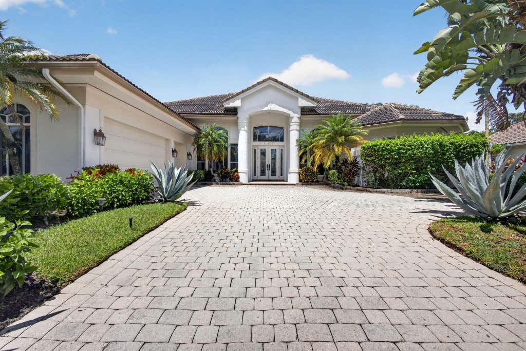 Photo of 10833 Egret Pointe Lane SE, West Palm Beach, FL 33412 (MLS # B26067687)