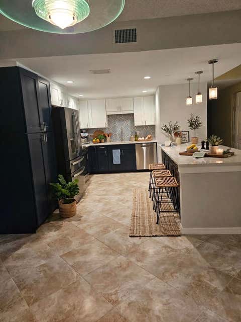 Photo of 250 SE FOUR WINDS Drive #104, Stuart, FL 34996 (MLS # B26064561)