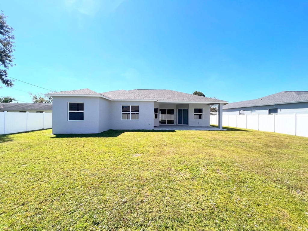 Photo of 2189 SE Genoa Street, Port Saint Lucie, FL 34952 (MLS # R10962584)