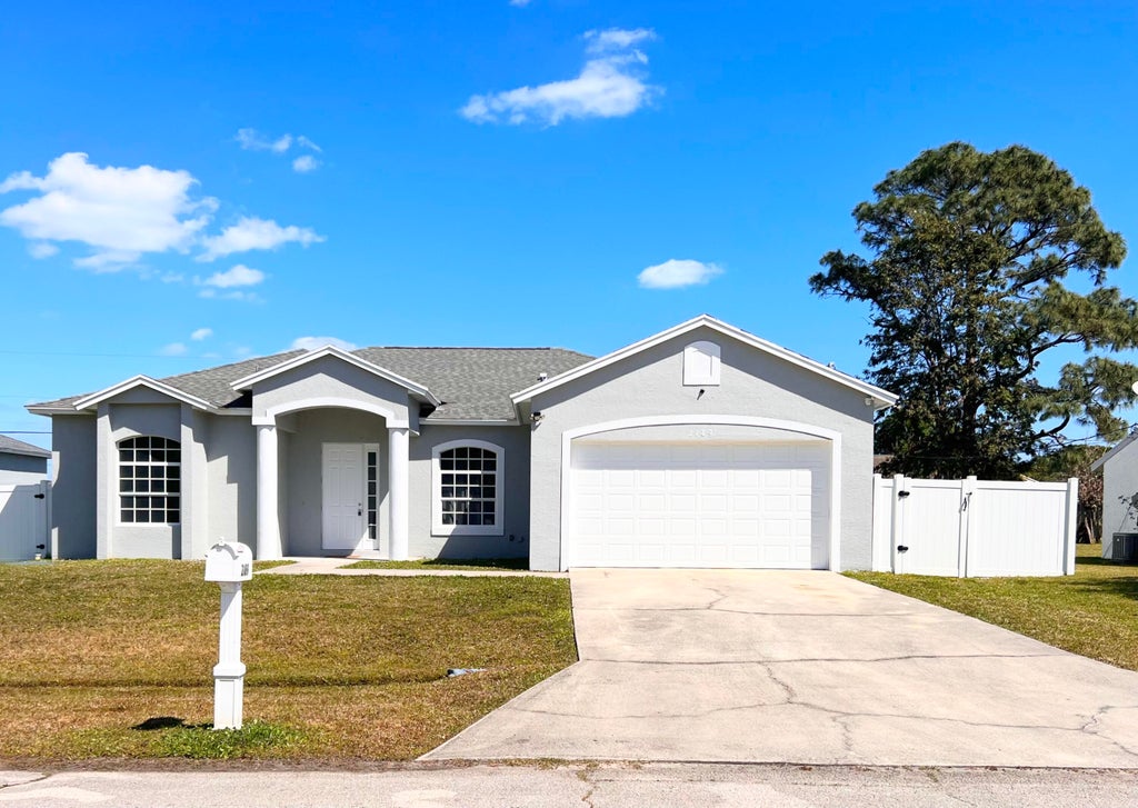 Photo of 2189 SE Genoa Street, Port Saint Lucie, FL 34952 (MLS # R10962584)