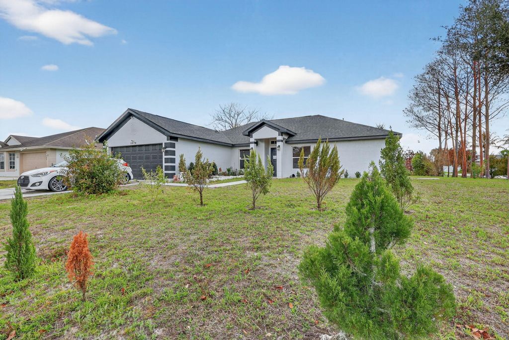 Photo of 1574 SW Fresno Road, Port Saint Lucie, FL 34953 (MLS # R11168808)